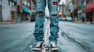 Evolution of Men's Ripped Jeans: From Rebellion to Mainstream Fashion